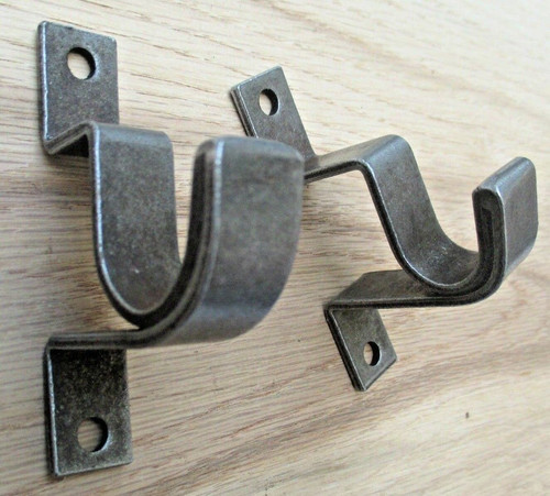 Pair pole holder - of,